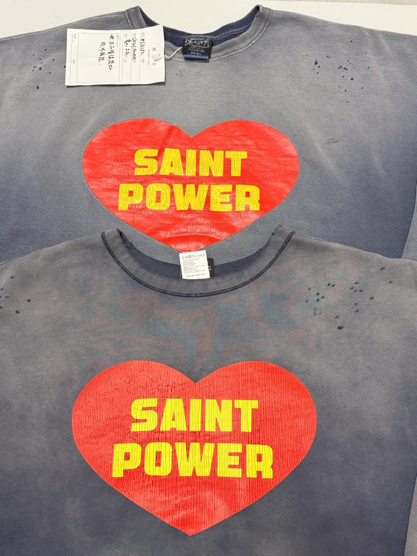 Prenatal printing SAINT Mxxxxxx CRW NECK SWT/SAINT POWER/NVY Love SAINT POWER faded sweatshirt Faded blue S-XL Assute dye Heavy horse, rewashed to make it old and damaged Faded Vintage style Authentic price printing process Rewashed water printing to make old cracks treatment Original loose tailoring Fabric custom woven and dyed Correct main label/wash water label/cherub label